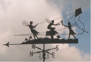 Fairies flying kites weathervane