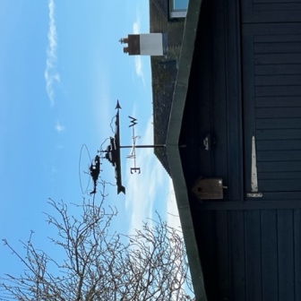 helicoptor and naval boat weathervane